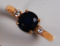 Lot 740 - A contemporary 18ct yellow gold sapphire and...