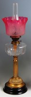 Lot 783 - A Victorian lacquered brass pedestal oil lamp,...