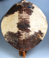 Lot 786 - An African Zulu ceremonial hide dance shield,...