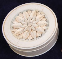 Lot 815 - An early 20th century carved ivory dressing...