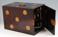 Lot 836 - A Japanese Meiji period Kodansu, black lacquer...