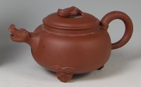 Lot 872 - A Chinese Yixing pottery teapot and cover, the...