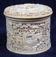 Lot 873 - A 19th century Chinese carved ivory jar and...