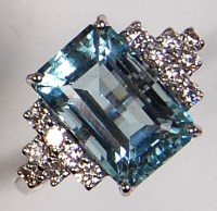 Lot 711 - An Art Deco style 18ct white gold, aquamarine...