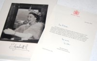 Lot 36 - Photograph of the Queen returning from opening...