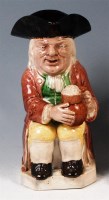 Lot 100 - A Ralph Wood Toby jug, the seated tippler...