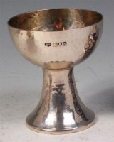 Lot 168 - A George V hammered silver pedestal bonbon...