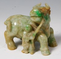 Lot 280 - A Chinese mottled jade carving of a water...