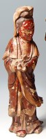 Lot 289 - An antique Chinese carved painted polychrome...