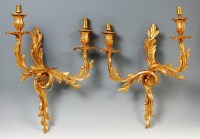 Lot 295 - A pair of neo-Rococo gilt metal twin branch...