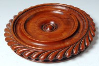 Lot 312 - A George III mahogany table coaster, of...