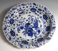Lot 68 - A Chinese export stoneware charger, underglaze...