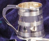 Lot 157 - A late Georgian silver christening mug, of...