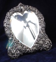 Lot 186 - An Edwardian silver heart shaped easel...