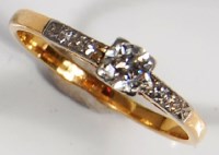 Lot 212 - An 18ct gold diamond solitaire ring, the old...