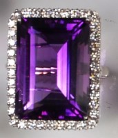 Lot 218 - A contemporary 18ct white gold amethyst and...