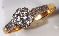 Lot 260 - An 18ct gold and platinum diamond solitaire...