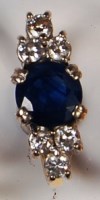 Lot 264 - An 18ct gold, sapphire and diamond dress ring,...