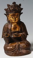 Lot 319 - A Chinese bronze of Guanyin in seated pose,...