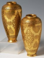 Lot 320 - Judaica - A pair of brass baluster form vases,...