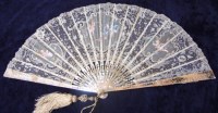 Lot 323 - A Victorian mother of pearl and lace ladies...