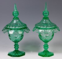 Lot 118 - A pair of mid 19th century green glass...