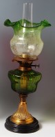 Lot 334 - A Victorian brass pedestal oil lamp, having an...