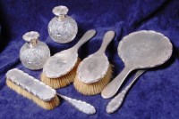 Lot 181 - A George V silver ladies dressing table set,...