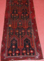 Lot 510 - A Kurdish woollen blue ground rug, having an...