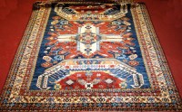 Lot 512 - A Persian woollen Tabriz type carpet, the...