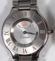 Lot 239 - A Cartier Must de steel cased ladies dress...