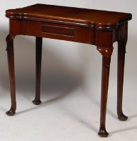 Lot 553 - An early George III mahogany tea table, having...