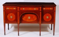 Lot 558 - A Sheraton style mahogany and satinwood inlaid...