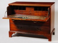 Lot 566 - A George III mahogany secretaire chest, having...