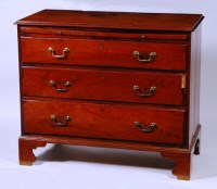 Lot 567 - An early George III mahogany squarefront chest,...