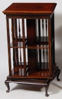 Lot 573 - An Edwardian mahogany and inlaid revolving...