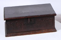 Lot 575 - An antique oak Bible box, having a hinged lid...