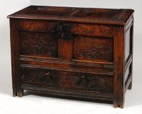 Lot 579 - An antique joined oak mule chest, having a two...