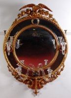 Lot 601 - A 19th century giltwood and gesso convex wall...