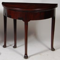 Lot 604 - An early George III mahogany demi-lune card...