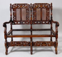 Lot 605 - A Caroleon style walnut framed double settee,...