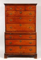 Lot 610 - A mid 18th century oak chest-on-chest, the...