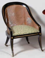 Lot 624 - A Regency ebonised single Bergere chair,...