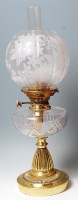 Lot 332 - A Victorian brass pedestal oil lamp, having a...