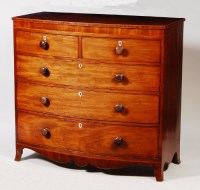 Lot 620 - A Regency mahogany bowfront chest, having...