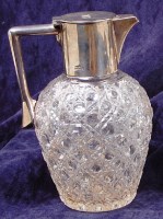 Lot 108 - An Edwardian silver mounted cut glass claret...