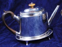 Lot 125 - A late Georgian teapot on stand, of...