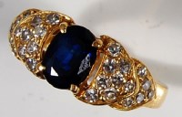 Lot 209 - A yellow gold sapphire and diamond ladies...