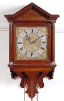 Lot 473 - An antique oak wall clock, having an...