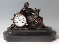 Lot 476 - A late 19th century French bronze mantel clock,...